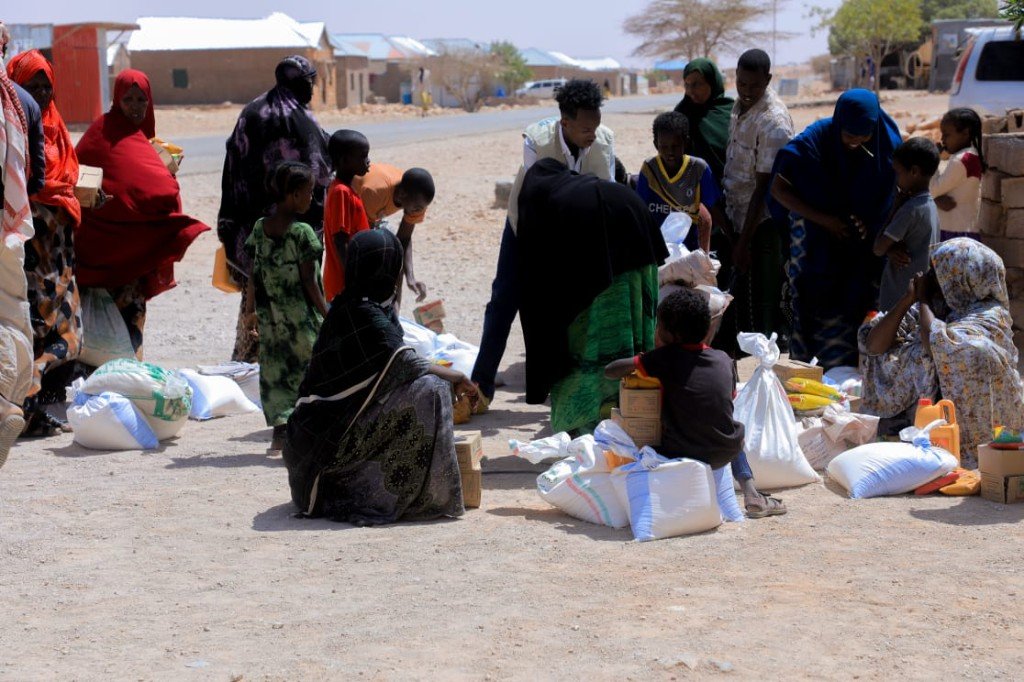 Aid distribution gathering in a rural community